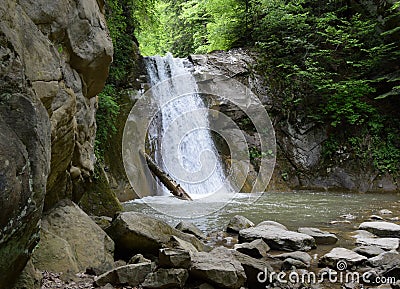 The landscape of Pruncea waterfall and the Casoca river in the Buzau mountains, Romania. A beautiful cascade in the forest Stock Photo