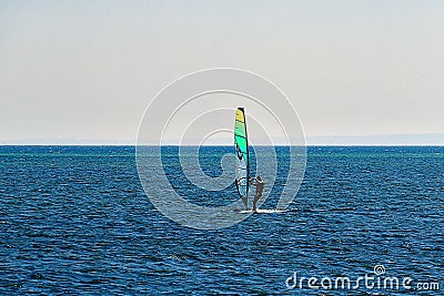 Landscape of the Puck Bay in Poland with windsurfingfloating on the water Stock Photo