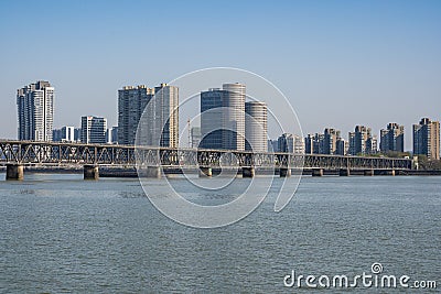 Landscape of Qiantang River Bridge and modern city skyline in Hangzhou, China Editorial Stock Photo