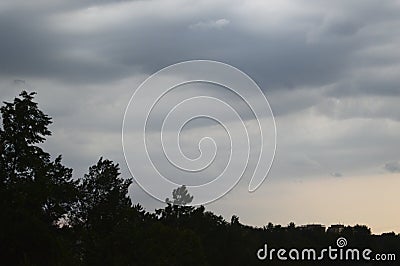 The rainy sky during a susnet. Stock Photo