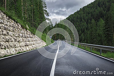 landscape with roadway. Highway in mountains in summer day in Italy, empty asphalt road. Dolomites, Alps Stock Photo