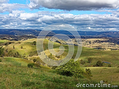 Landscape rolling hills Australian country with estates far view Stock Photo