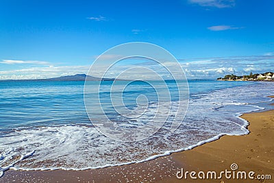 Landscape Scenery of Milford Beach Auckland New Zealand; View to Rangitoto Island during Sunny Day Stock Photo