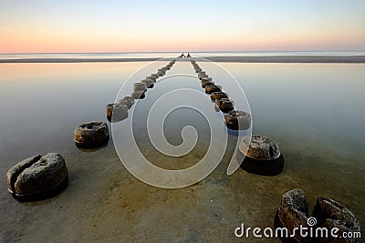 Landscape, sea, breakwater, sunset, Baltic Sea, Kolobrzeg. Stock Photo