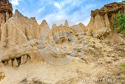 Landscape of soil textures eroded sandstone pillars, columns and cliffs, Stock Photo