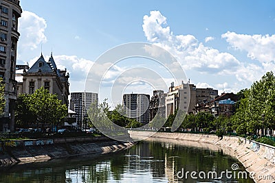 The landscape of Splaiul Independentei Boulevard with the Dambovita river and important architectural buildings Editorial Stock Photo