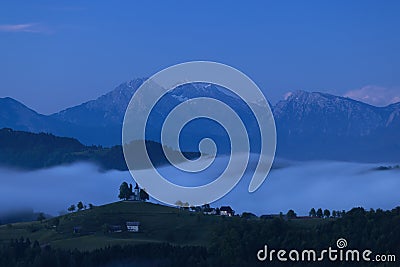 Landscape with St. Thomas Church (Cerkev Sveti Tomaz) near Skofja Loka, Slovenia Stock Photo