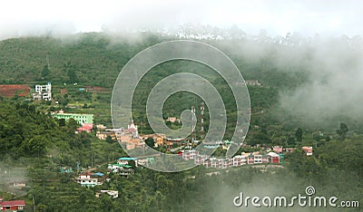 A landscape with stacked houses built and trees on the kodaikanal tour place. Stock Photo