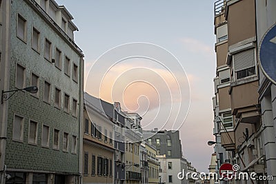 Landscape of street view of traditional buildings at sunset in Lisbon Portugal Editorial Stock Photo