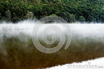 Thick morning mist in Dniester Canyon, Ukraine Stock Photo