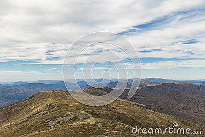 Landscape top view highland mountain ridge scenic environment picturesque horizon background with cloudy sky September autumn Stock Photo