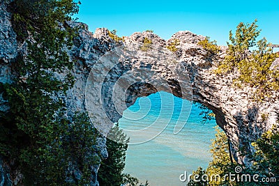 Landscape view of Arch Rock looking out over Lake Huron on Mackinac Island Stock Photo