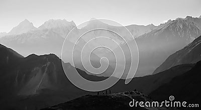 Landscape view of mountains in Karakoram range with morning fog. Stock Photo