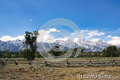 Landscape of the Grand Teton mountain range from the Chapel of the Transfiguration Stock Photo