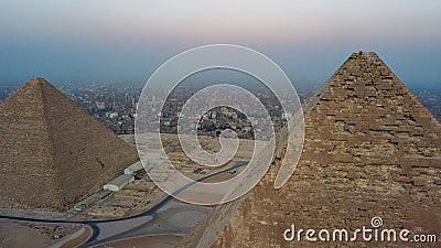 Landscape view of Pyramid of Khafre and Pyramid of Khufu, Giza pyramids landscape. historical egypt pyramids shot by drone. Stock Photo