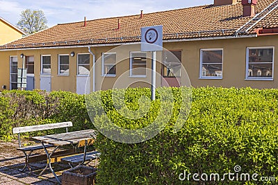 Landscape view of rest place with No smoking sign near hospital. Stock Photo