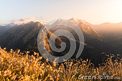 Landscape view of the sunset golden light over the Grand Combin mountain in Switzerland Stock Photo