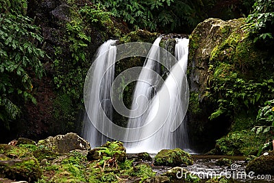 Green vegetation landscape with waterfalls in Azores islands Stock Photo