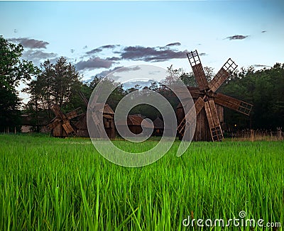 Landscape with wind mills in Dumbrava lake Stock Photo