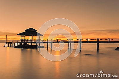 Landscape of Wooded bridge pier between sunset. Summer travel in Stock Photo