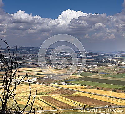 Landscape Jezreel valley in northwest of Israel in cloudy sky Stock Photo