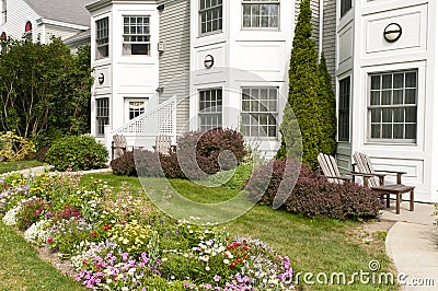 Landscaped apartment flowerbeds Stock Photo