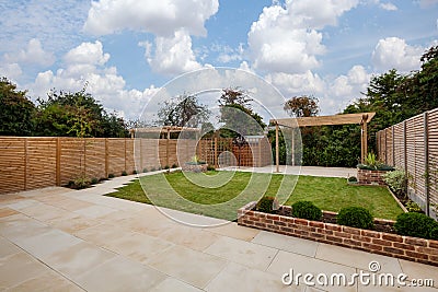 Landscaped new house gardens with patio Stock Photo