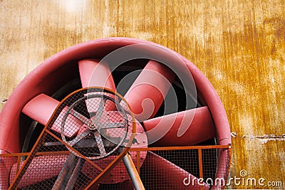 Landschaftspark Duisburg, Germany: Close up of red turbine with driving belt and rusty steel wall Editorial Stock Photo
