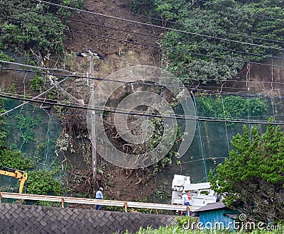 Landslide in Japan, Cliff has collapsed on road. Stock Photo