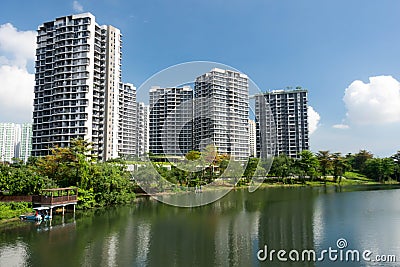 Lanscape view of condomium with trees near river Stock Photo
