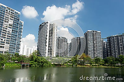 Lanscape view of condomium with trees near river Stock Photo