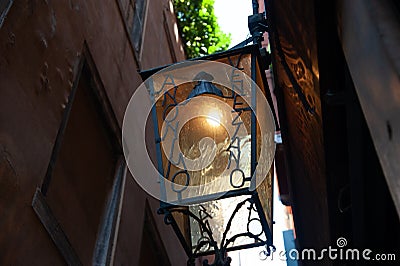 Lantern in an alley of Venice Editorial Stock Photo