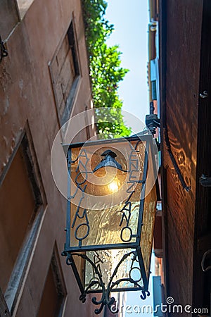 Lantern in an alley of Venice Editorial Stock Photo