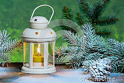 Lantern and Christma tree in the snow Stock Photo