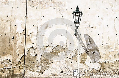 Lantern on cracked wall Stock Photo