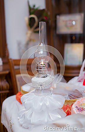 Made from a pearl for a wedding . Lantern kerosene oil Lamp Stock Photo