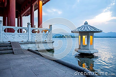 Lantern on a lake in Royal Wharf in Wenying Park, Hangzhou, China Editorial Stock Photo
