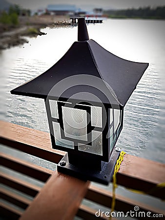 Lantern or Light House For Outdoor at The Cafetaria. Stock Photo
