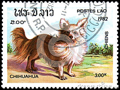 LAOS - CIRCA 1982: postage stamp, printed in Laos, shows a Chihuahua dog Editorial Stock Photo