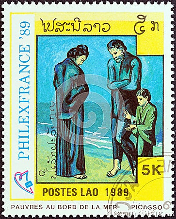 LAOS - CIRCA 1989: A stamp printed in Laos shows Poor on Seashore, circa 1989. Editorial Stock Photo