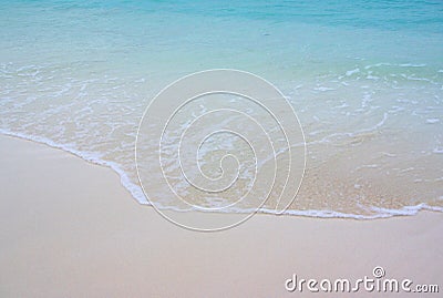 Lapping waves at Kuda Bandos, Maldives Stock Photo