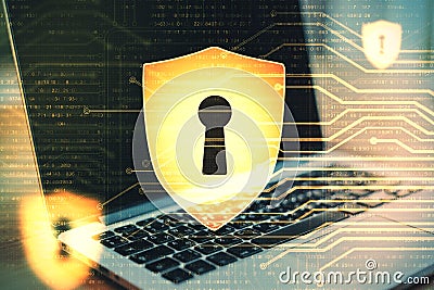 Laptop with antivirus shield hologram Stock Photo