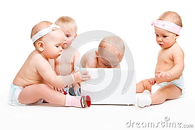 Laptop babies Stock Photo