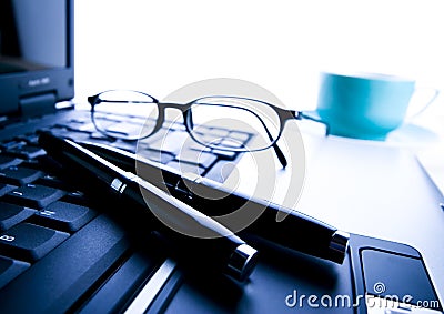Laptop & Ballpoint & Glasses Stock Photo