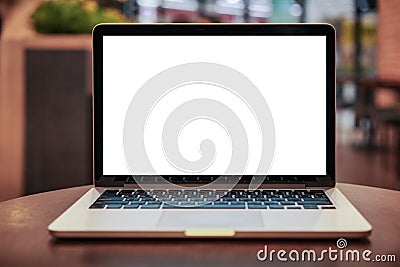 Laptop with blank screen on table. Conceptual workspace, Laptop computer with blank white screen on table, Blurred background. Stock Photo