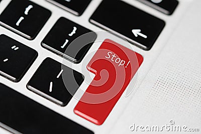 Laptop computer keyboard with `Stop!` button Stock Photo