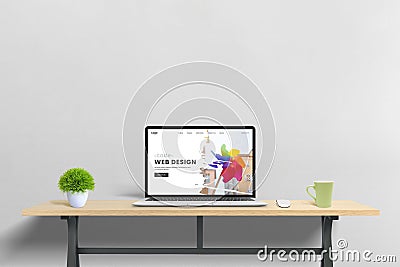 Laptop computer showcasing a web design studio page presentation, representing the concept of modern web development Stock Photo