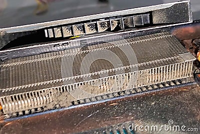 Laptop CPU cooling fan and radiator with clogged guide vanes. In work, clogged with dust, leads to noise, overheating Stock Photo