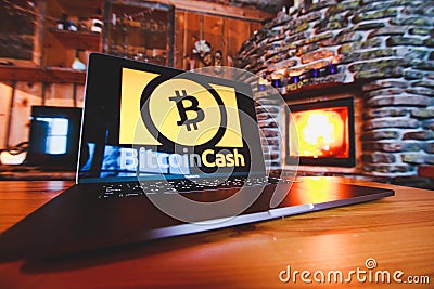 Laptop with cryptocurrency background Editorial Stock Photo