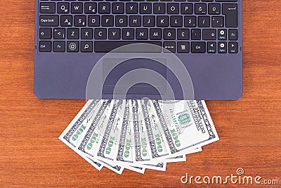 Laptop Detail and Banknotes Stock Photo